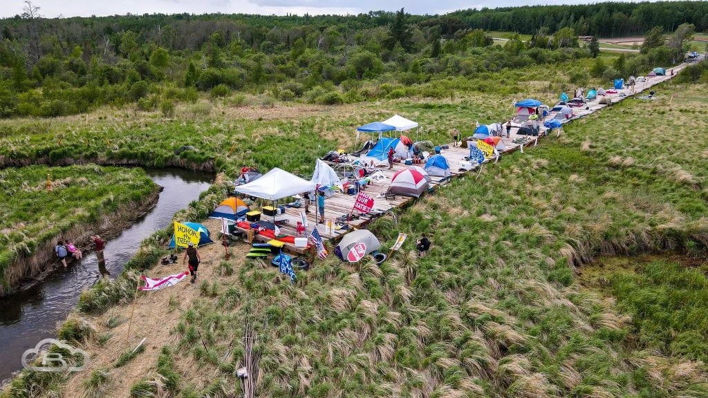 Water Protectors camped along the Mississippi River in defense of the land and Indigenous Sovereignty