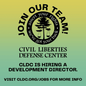 A green and yellow ombre background. CLDC logo depicts a tree with scales hanging from either side. Text reads: JOIN OUR TEAM! Assert your rights - We've got your back. Civil Liberties Defense Center is hiring a Development Director. Visit cldc.org/jobs for more info.